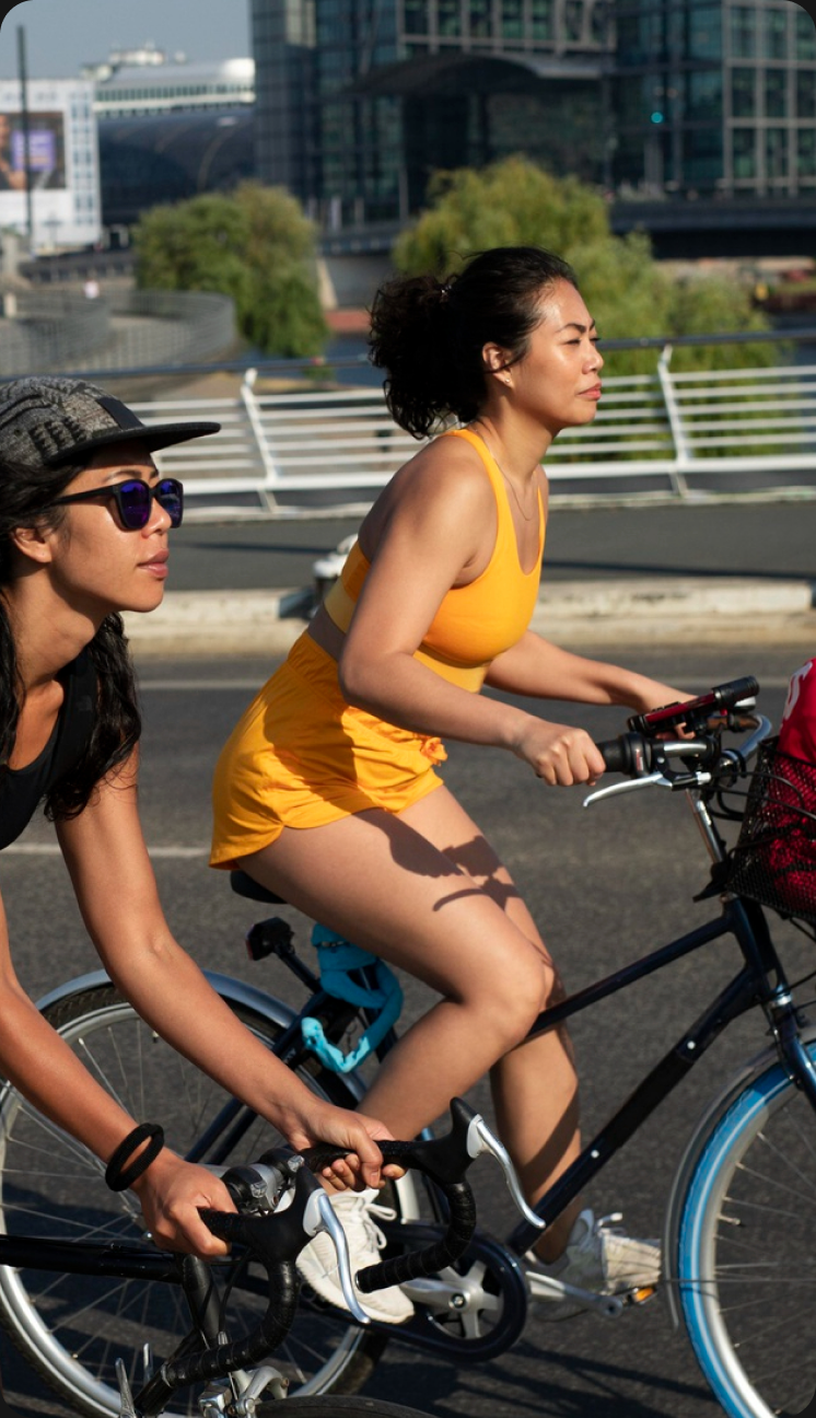 Cyclist riding along an open path